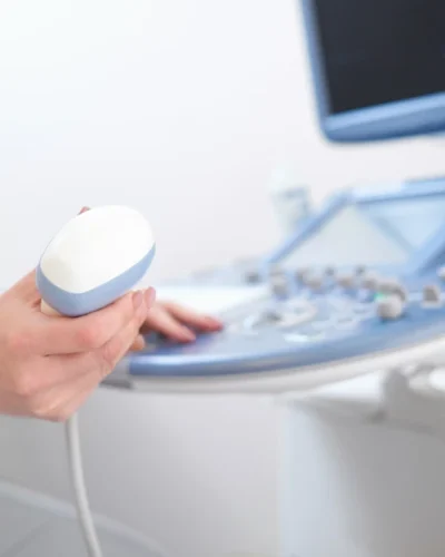 beautiful-female-doctor-sitting-her-office-near-ultrasound-sc